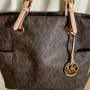 Michael Kors Jet Set handbag and wristlet